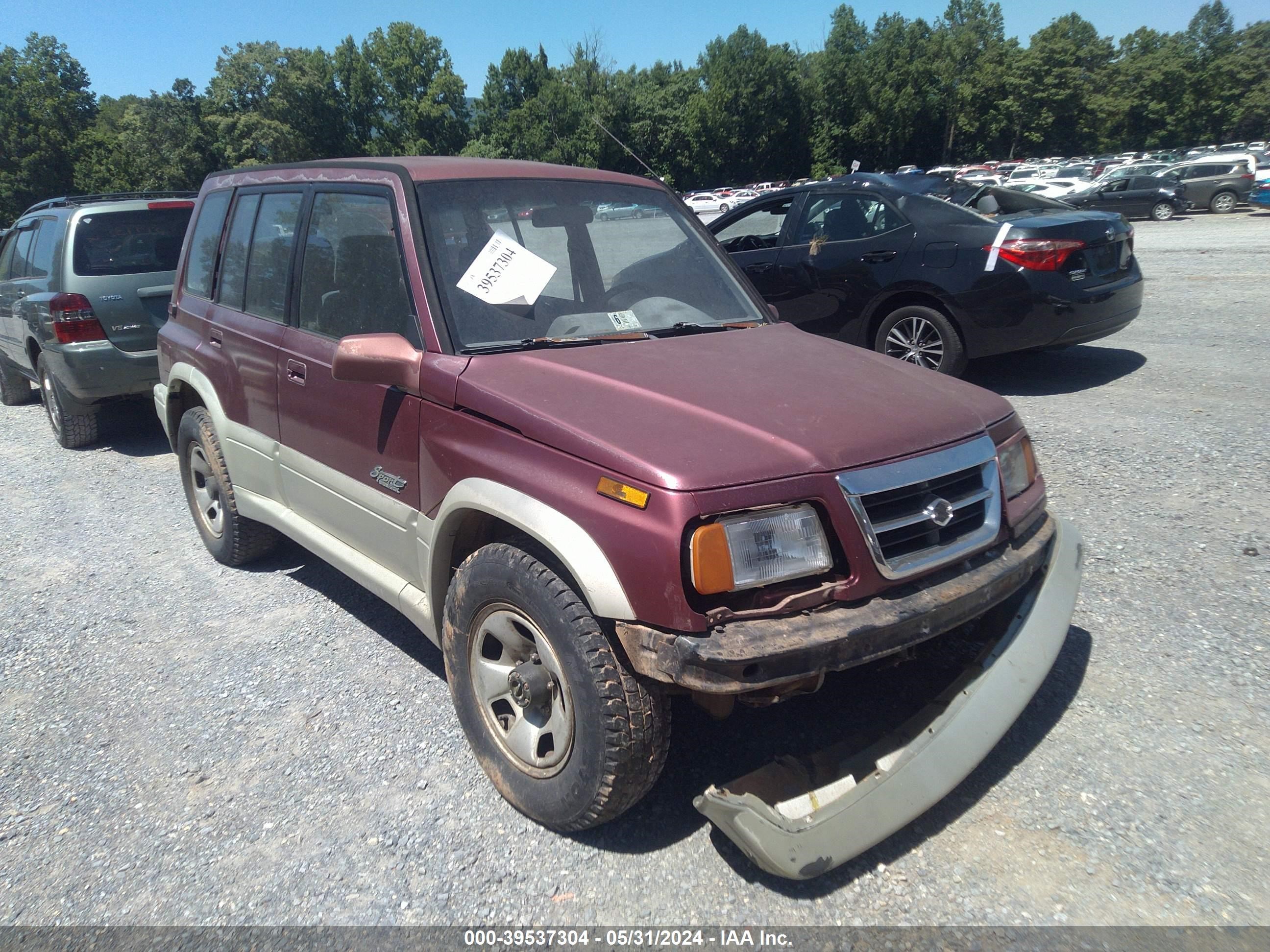 Photo 11 VIN: JS3TD21V7W4107475 - SUZUKI SIDEKICK 