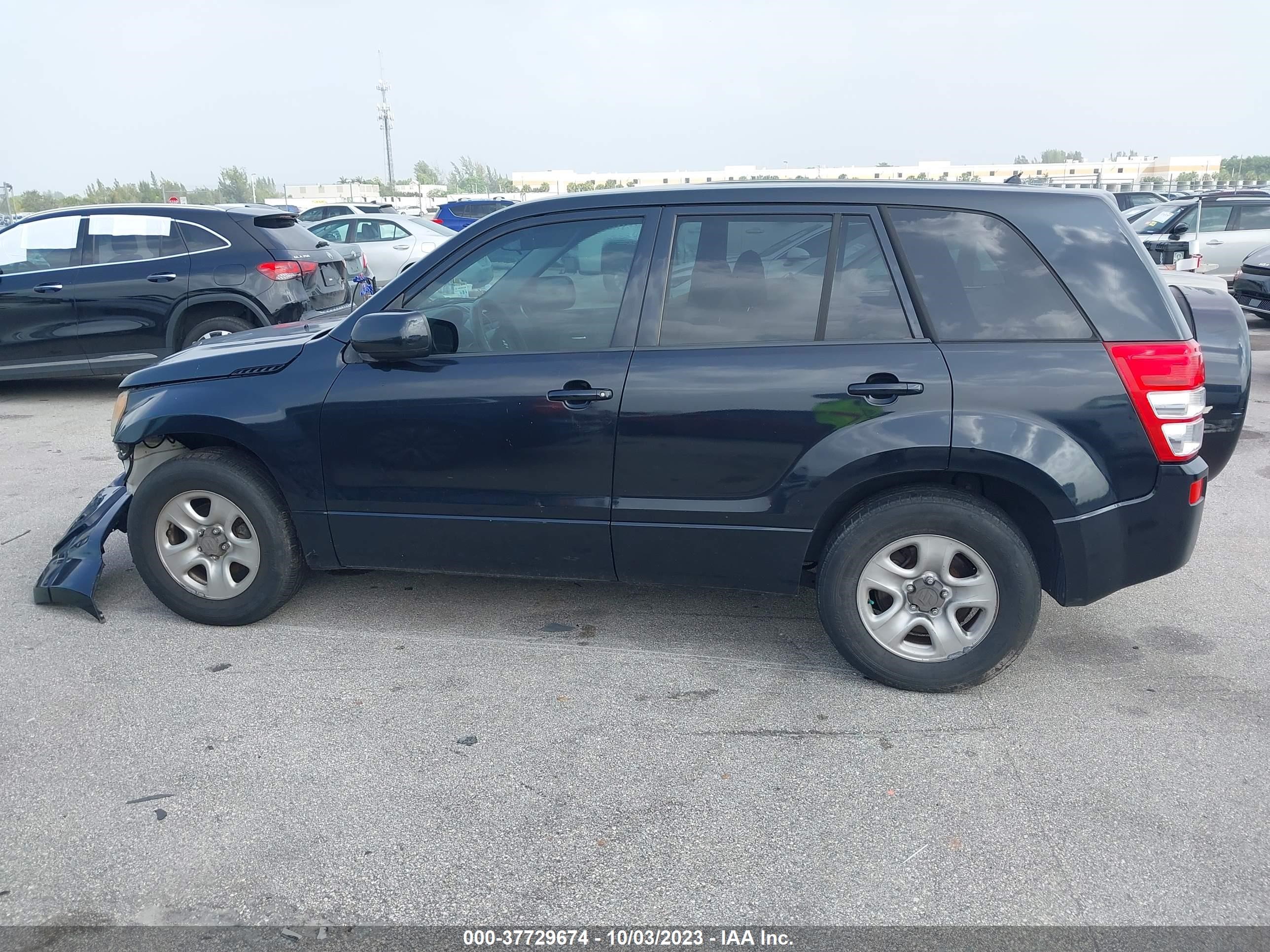 Photo 13 VIN: JS3TE0D27A4100716 - SUZUKI GRAND VITARA 