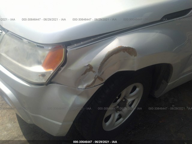 Photo 5 VIN: JS3TE0D2XB4100680 - SUZUKI GRAND VITARA 