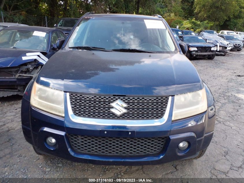 Photo 11 VIN: JS3TE0D79C4100442 - SUZUKI GRAND VITARA 