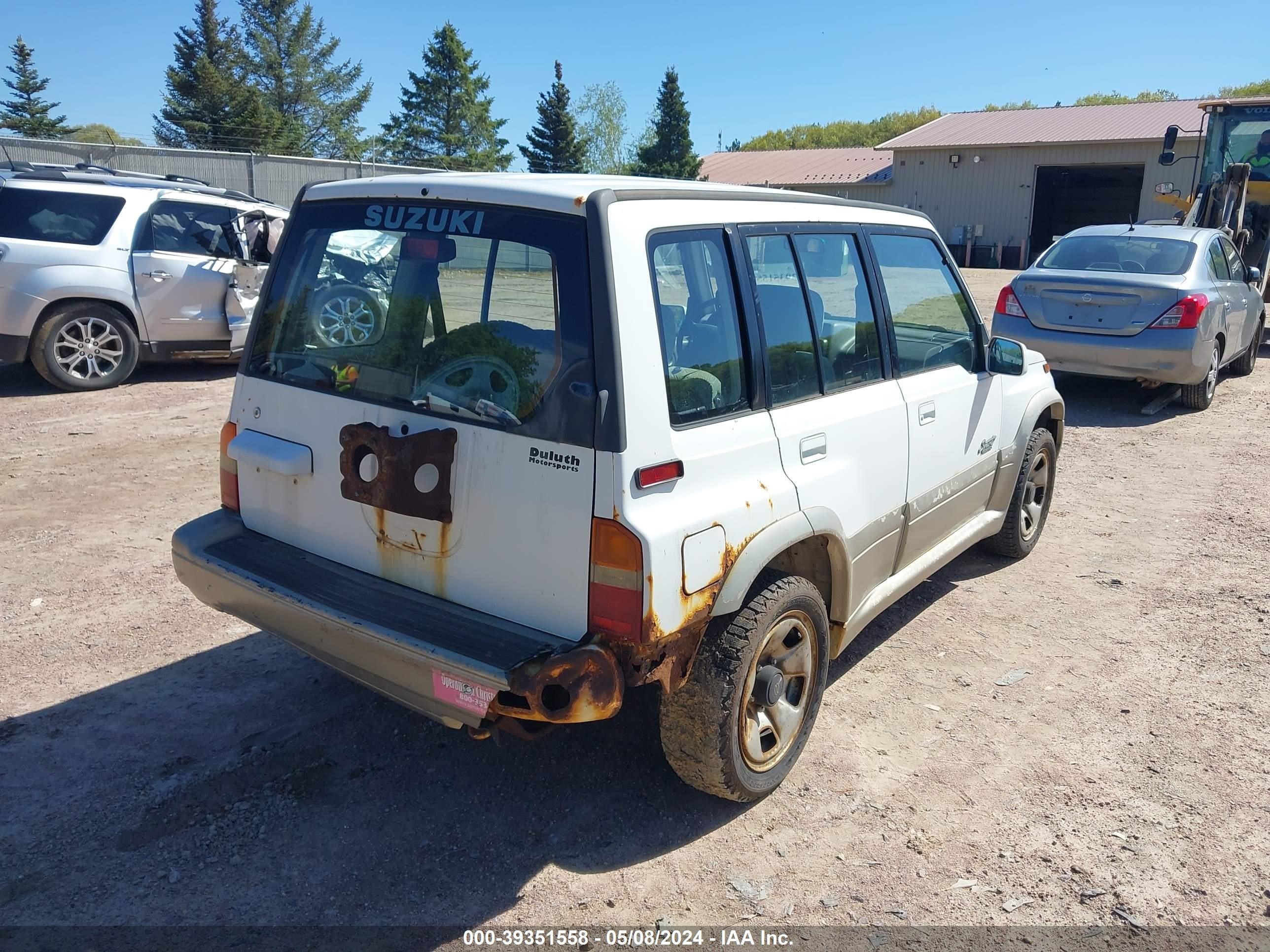 Photo 3 VIN: JS3TE21VXW4100405 - SUZUKI SIDEKICK 