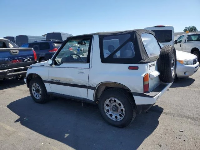 Photo 1 VIN: JS4TA01C4K4105765 - SUZUKI SIDEKICK J 