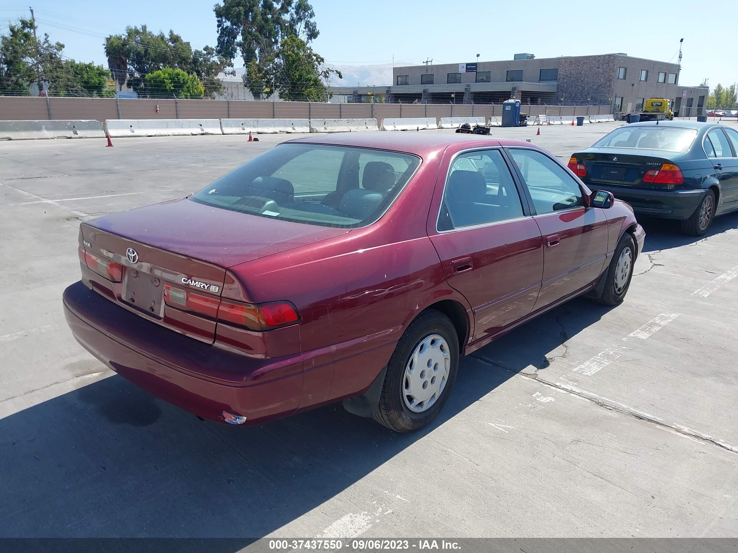 Photo 3 VIN: JT2BG22K1W0213409 - TOYOTA CAMRY 