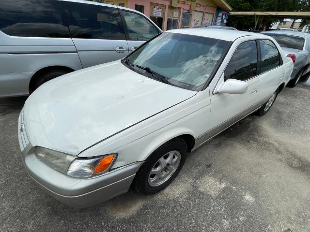 Photo 1 VIN: JT2BG22K1X0375400 - TOYOTA CAMRY LE 