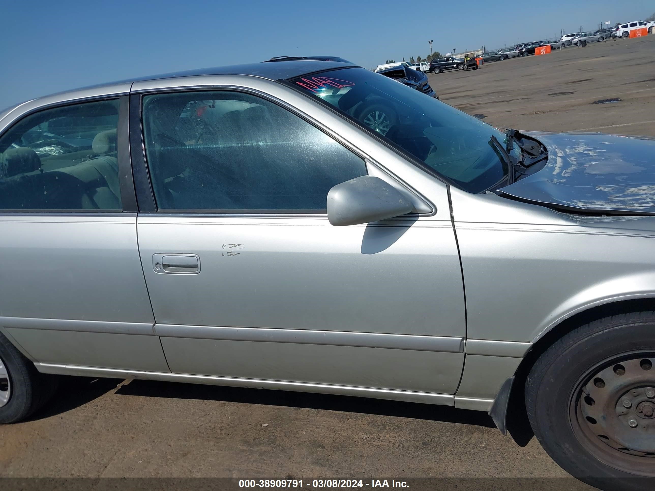 Photo 12 VIN: JT2BG22K7Y0499219 - TOYOTA CAMRY 