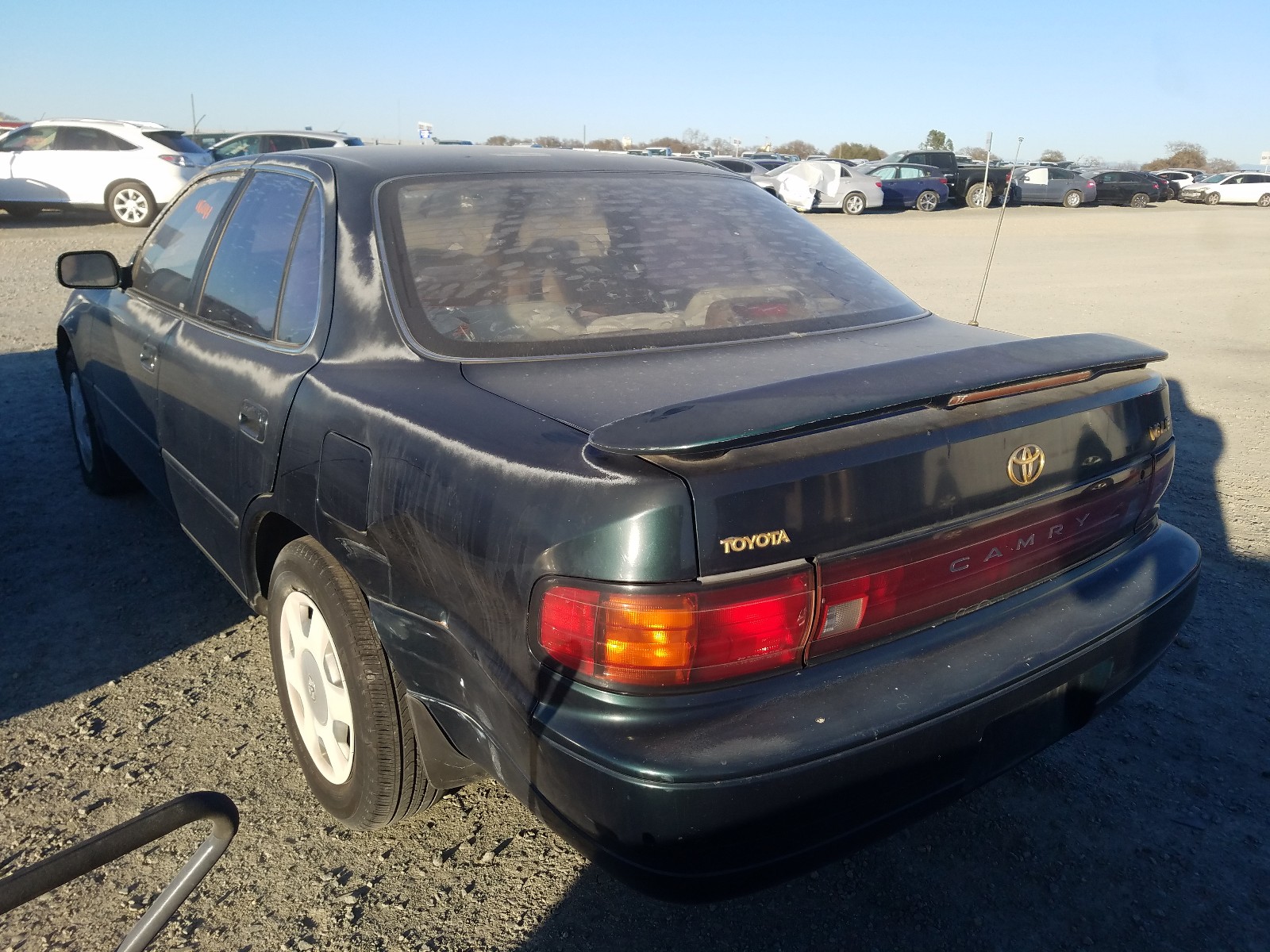 Photo 2 VIN: JT2GK12E0R0032024 - TOYOTA CAMRY 