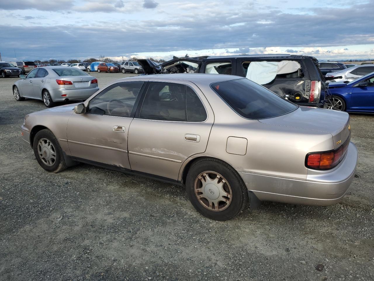 Photo 1 VIN: JT2GK13E2R0012887 - TOYOTA CAMRY 