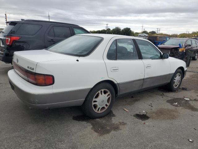 Photo 2 VIN: JT2GK13E5R0008509 - TOYOTA CAMRY XLE 