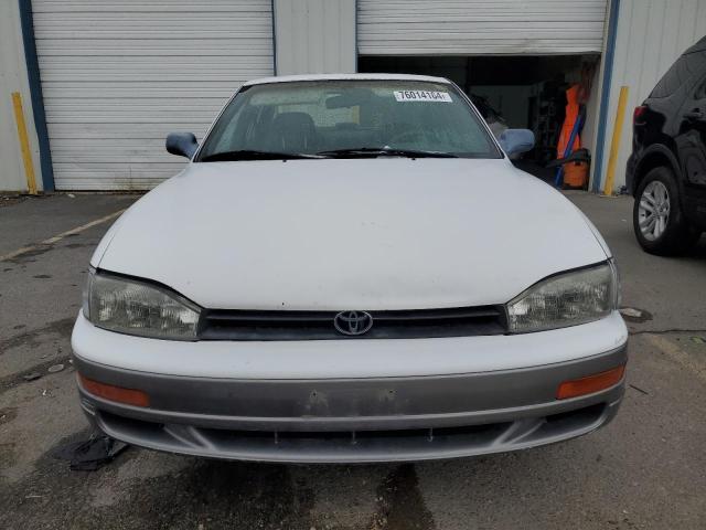 Photo 4 VIN: JT2GK13E5R0008509 - TOYOTA CAMRY XLE 