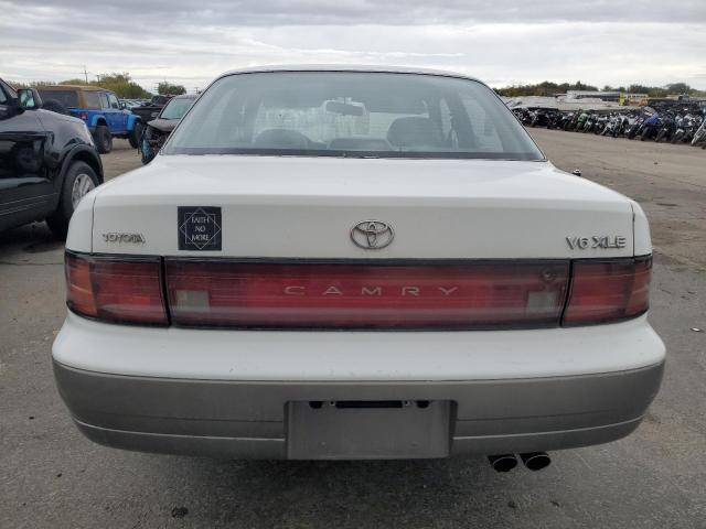 Photo 5 VIN: JT2GK13E5R0008509 - TOYOTA CAMRY XLE 