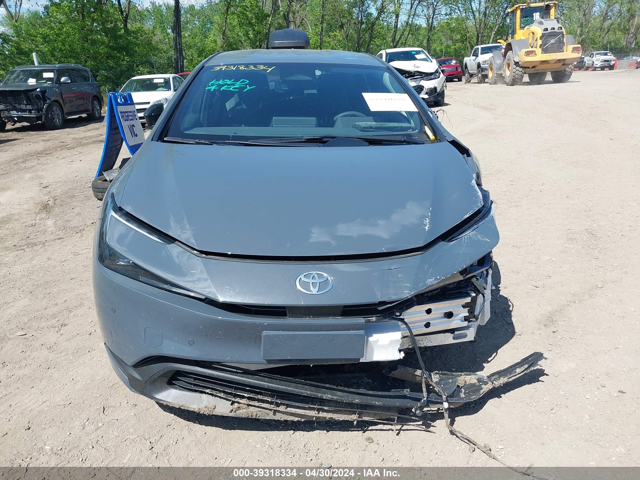 Photo 12 VIN: JTDACAAU6R3021062 - TOYOTA PRIUS 