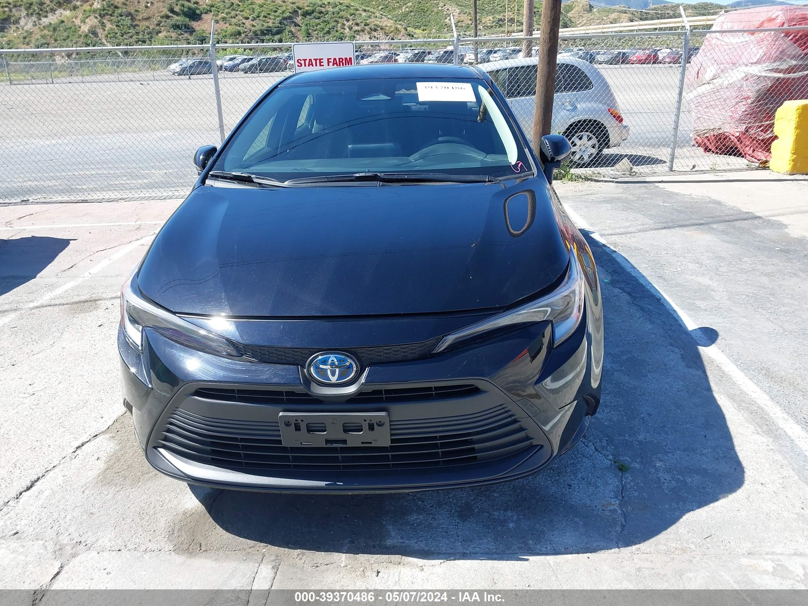 Photo 11 VIN: JTDBCMFEXR3045680 - TOYOTA COROLLA 