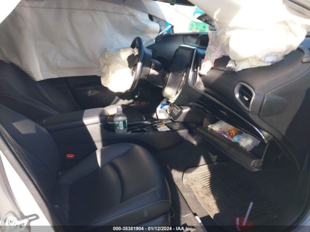 Photo 4 VIN: JTDKAMFP1M3187948 - TOYOTA PRIUS PRIME 