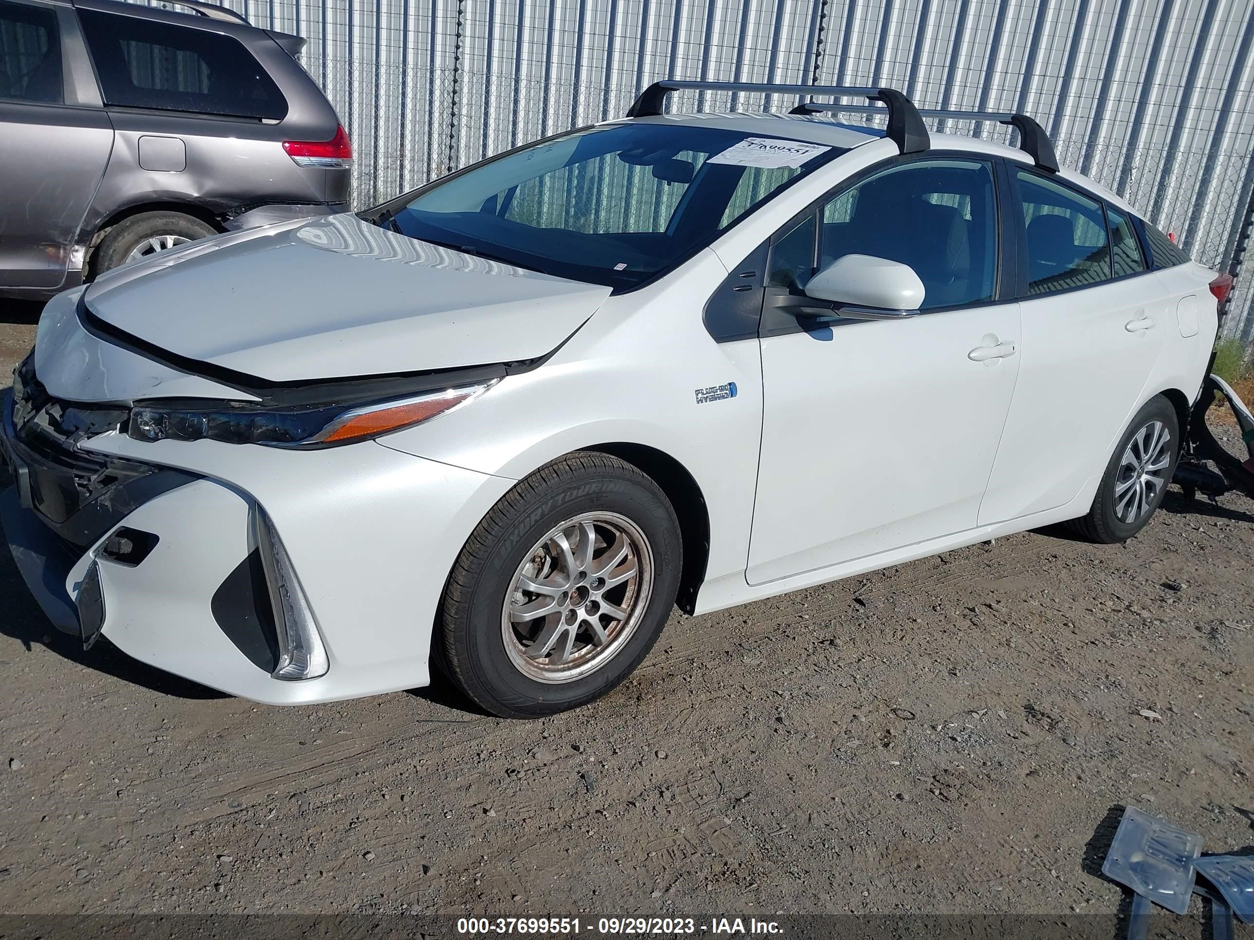 Photo 1 VIN: JTDKAMFP2M3168857 - TOYOTA PRIUS 