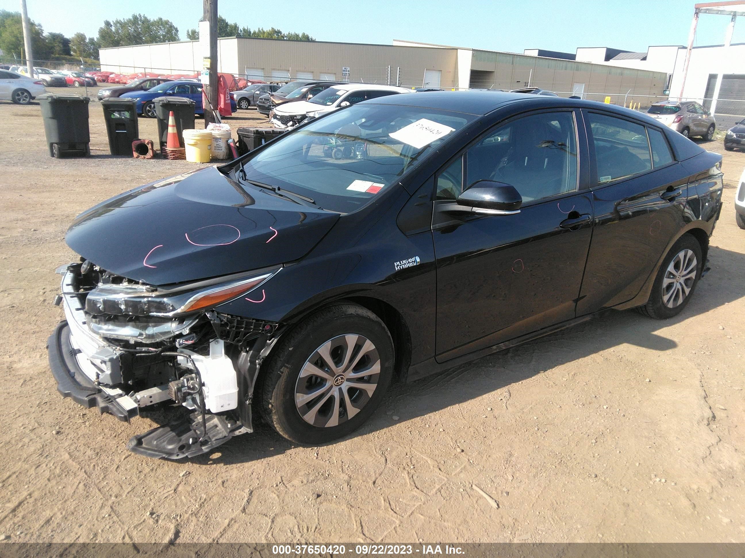 Photo 1 VIN: JTDKAMFP4M3185014 - TOYOTA PRIUS 