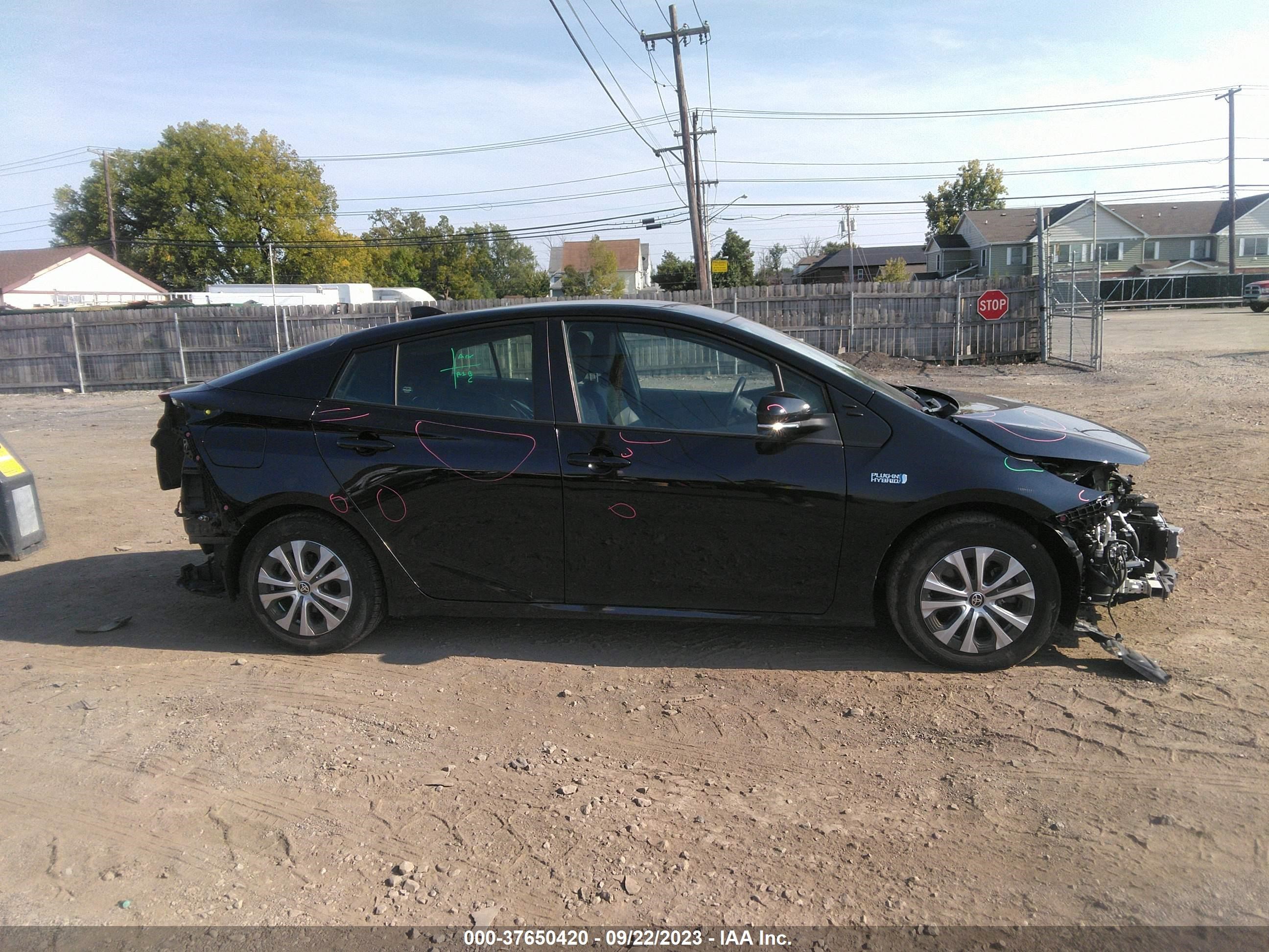 Photo 12 VIN: JTDKAMFP4M3185014 - TOYOTA PRIUS 