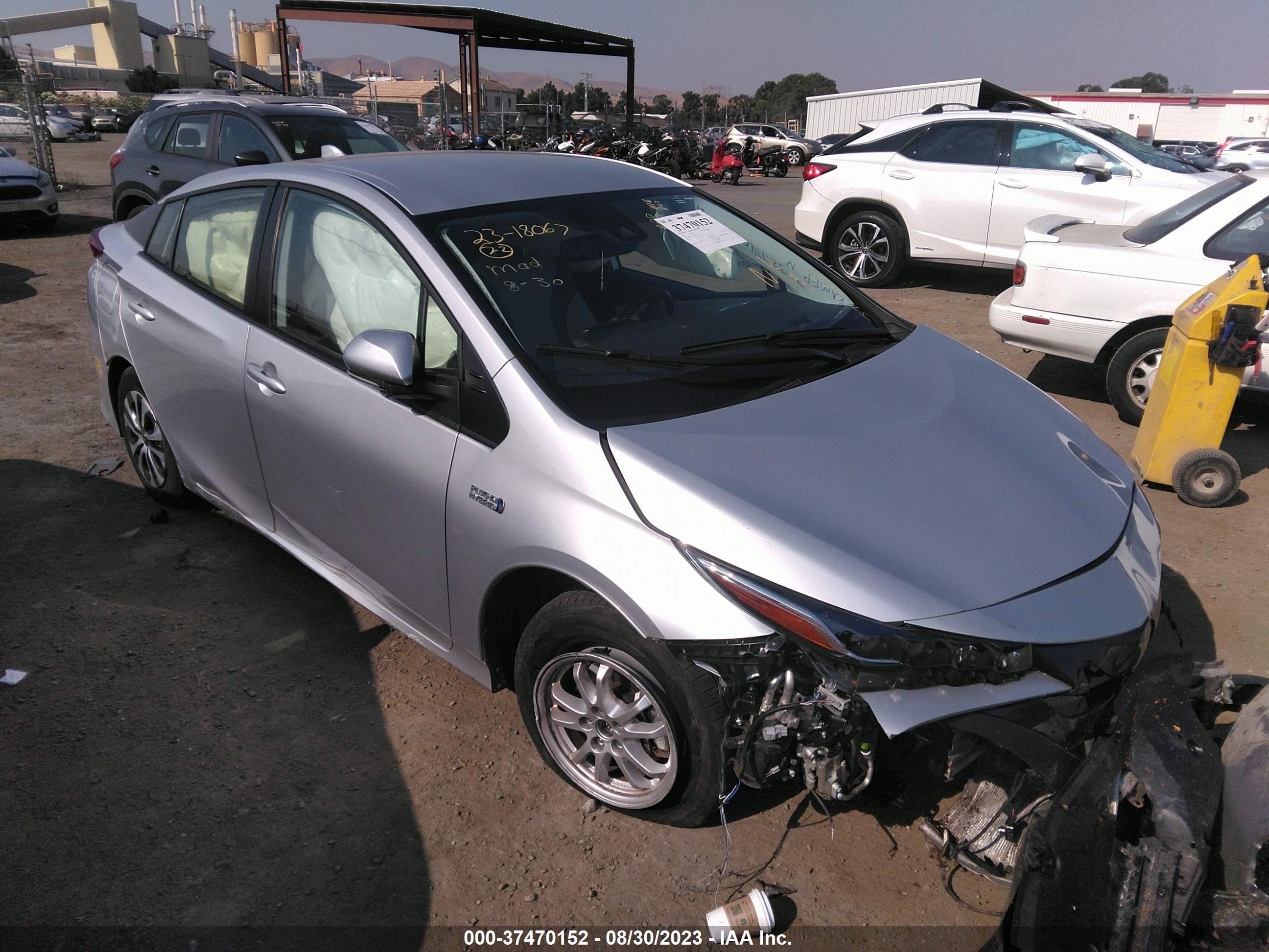 Photo 0 VIN: JTDKAMFP7N3211140 - TOYOTA PRIUS 