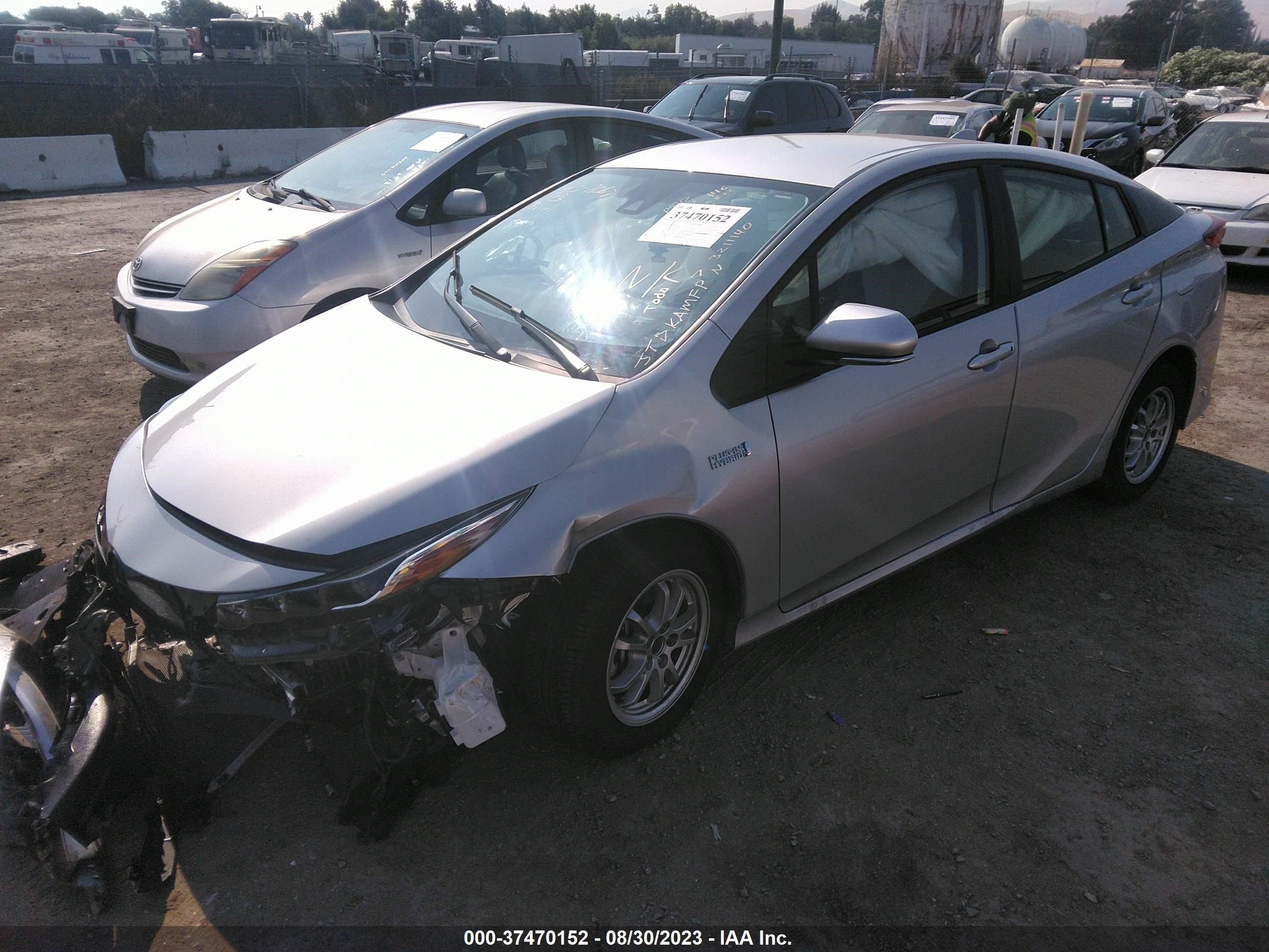 Photo 1 VIN: JTDKAMFP7N3211140 - TOYOTA PRIUS 