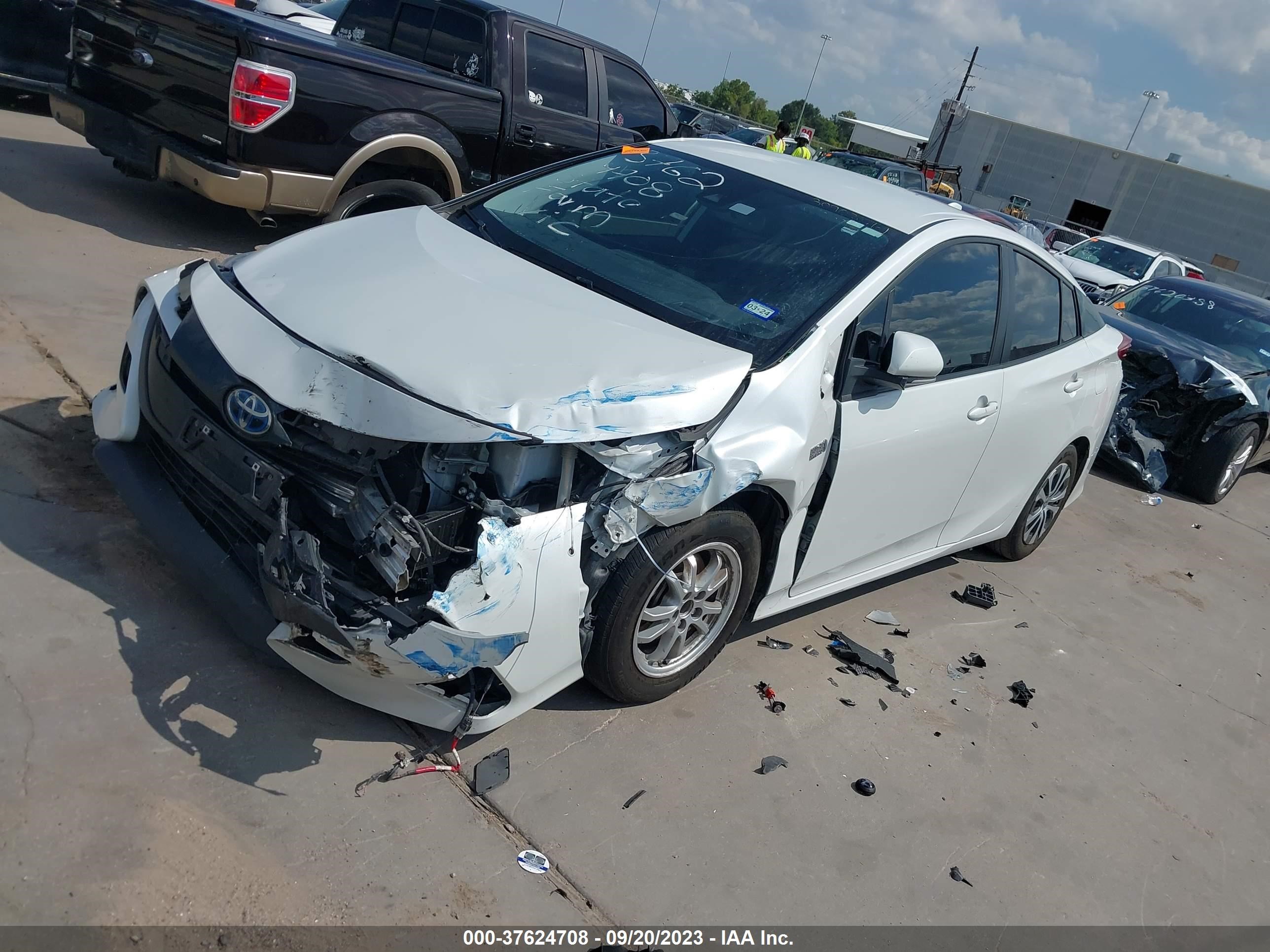 Photo 1 VIN: JTDKAMFP8M3181130 - TOYOTA PRIUS 