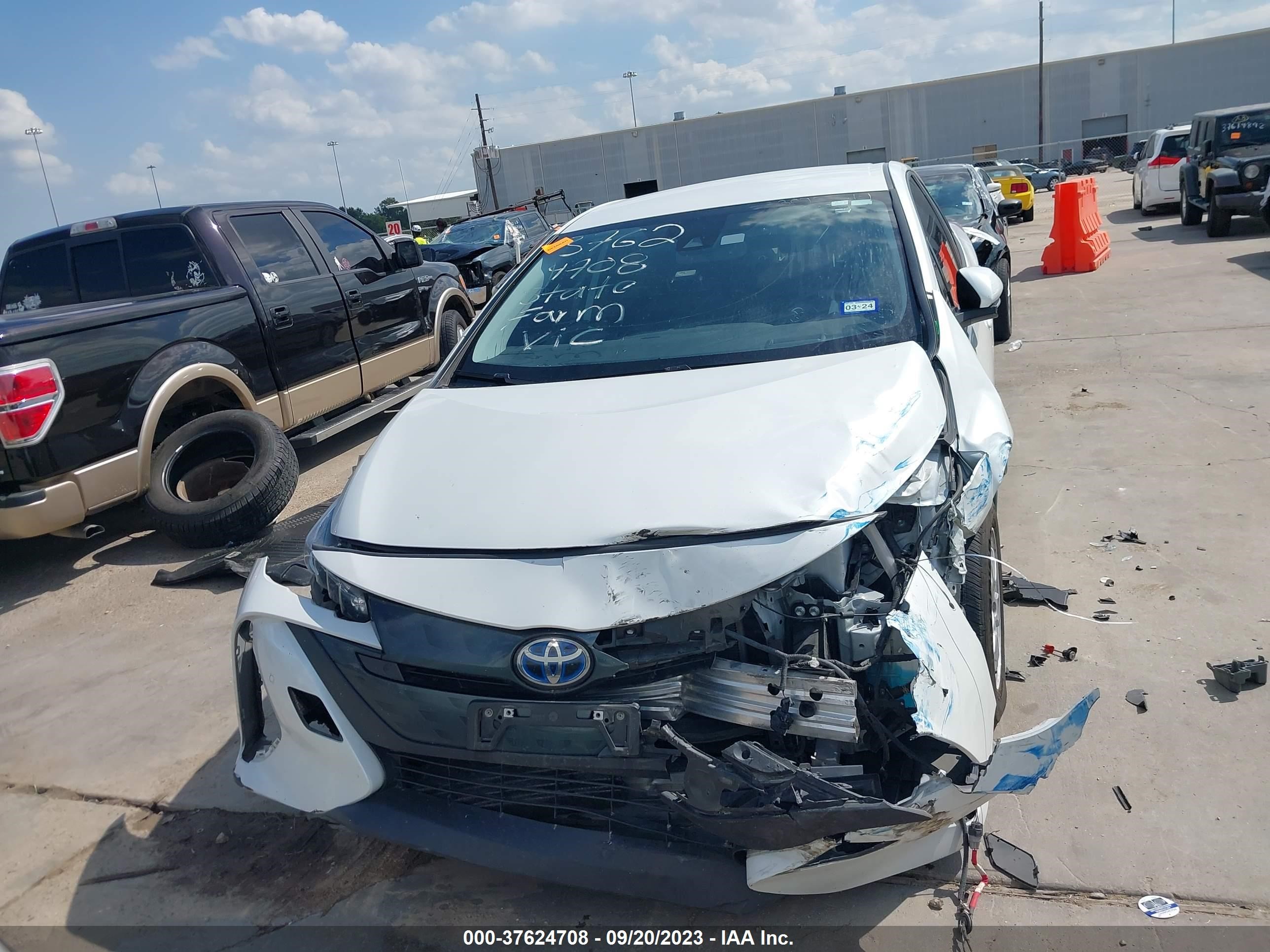 Photo 5 VIN: JTDKAMFP8M3181130 - TOYOTA PRIUS 