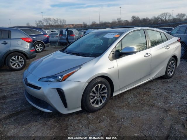 Photo 1 VIN: JTDKAMFU0M3138391 - TOYOTA PRIUS 