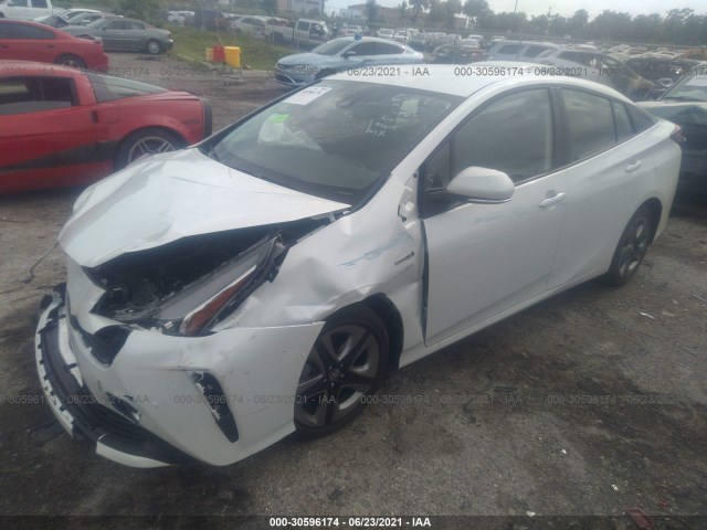 Photo 1 VIN: JTDKAMFU6M3133230 - TOYOTA PRIUS 