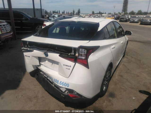 Photo 3 VIN: JTDKARFU7K3100523 - TOYOTA PRIUS 