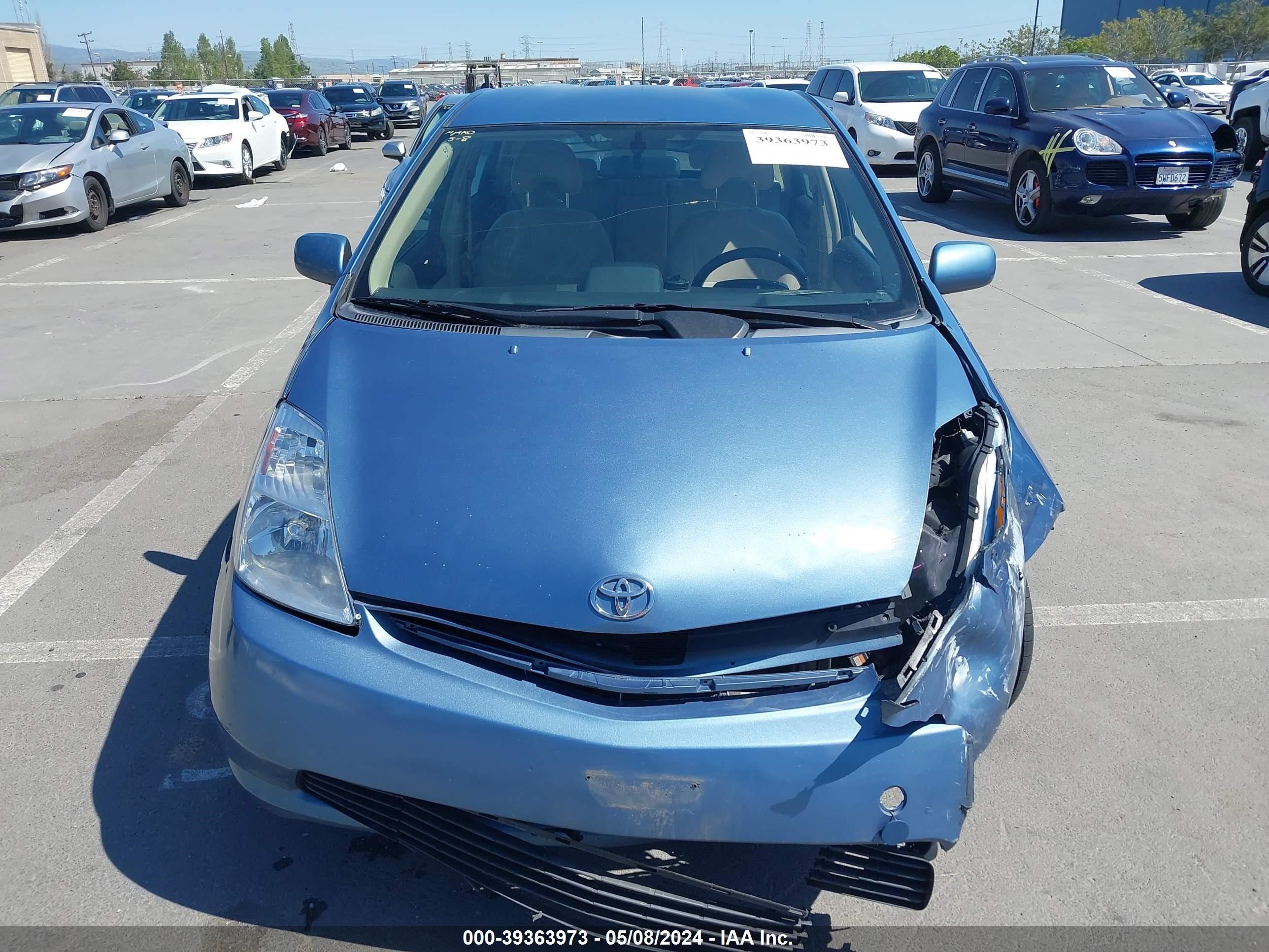 Photo 11 VIN: JTDKB20UX40058897 - TOYOTA PRIUS 