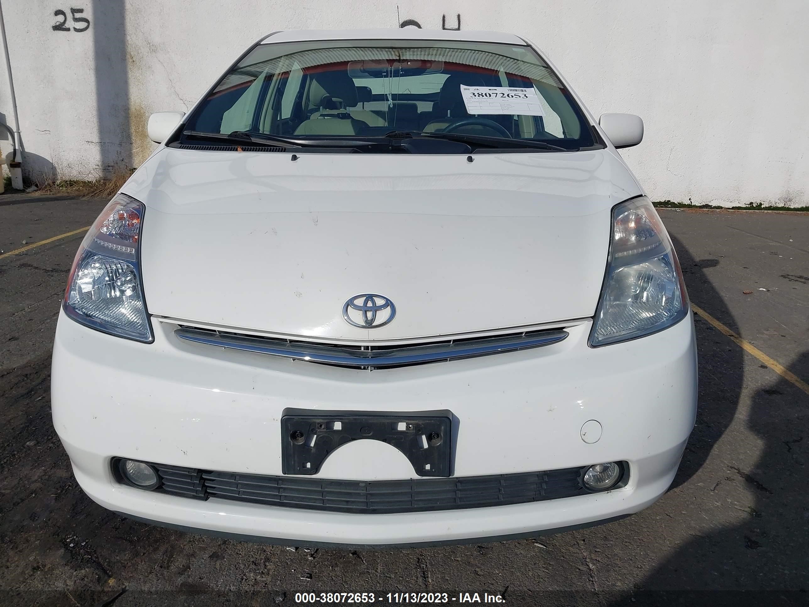 Photo 11 VIN: JTDKB20UX93488290 - TOYOTA PRIUS 