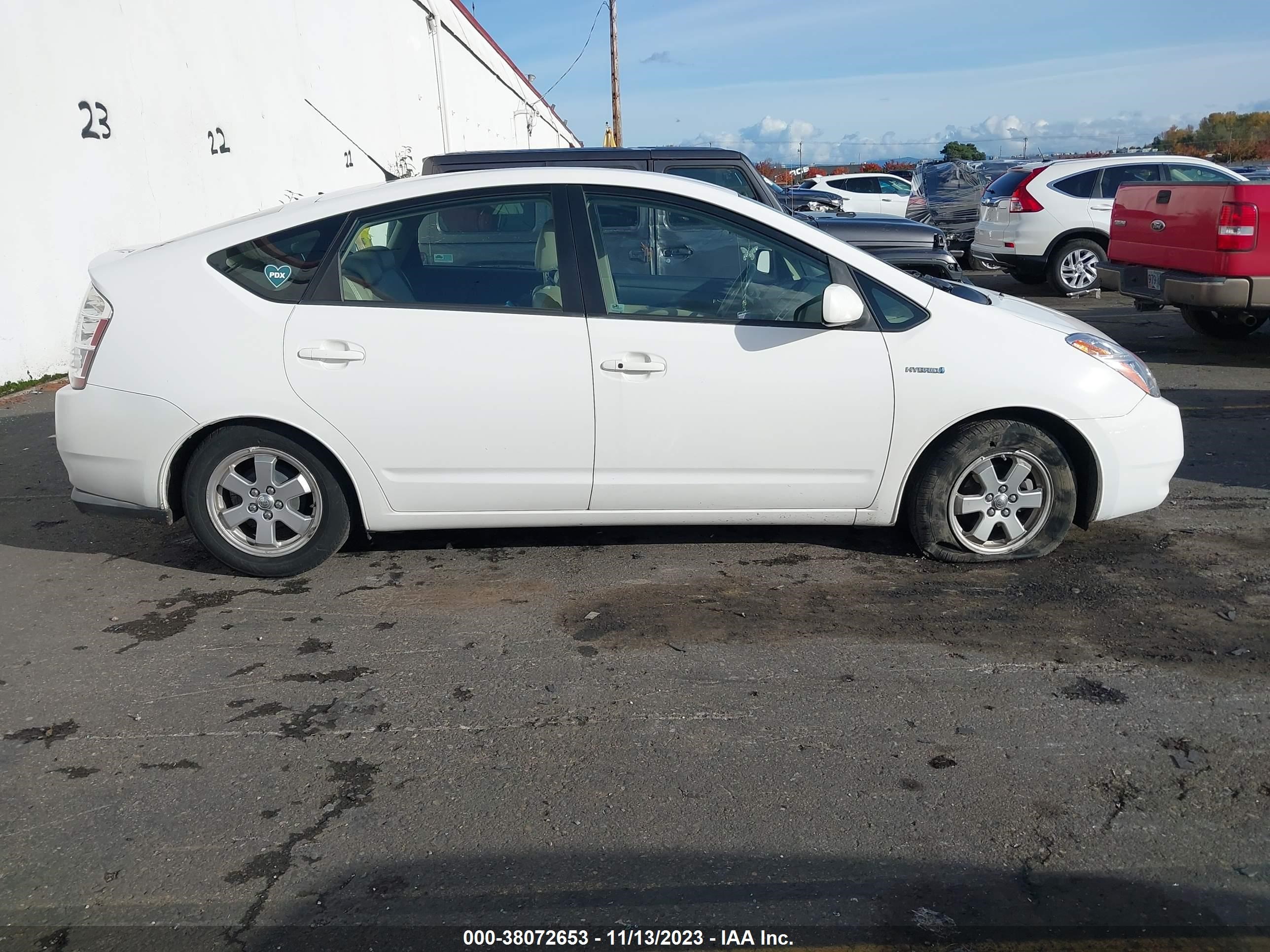 Photo 12 VIN: JTDKB20UX93488290 - TOYOTA PRIUS 