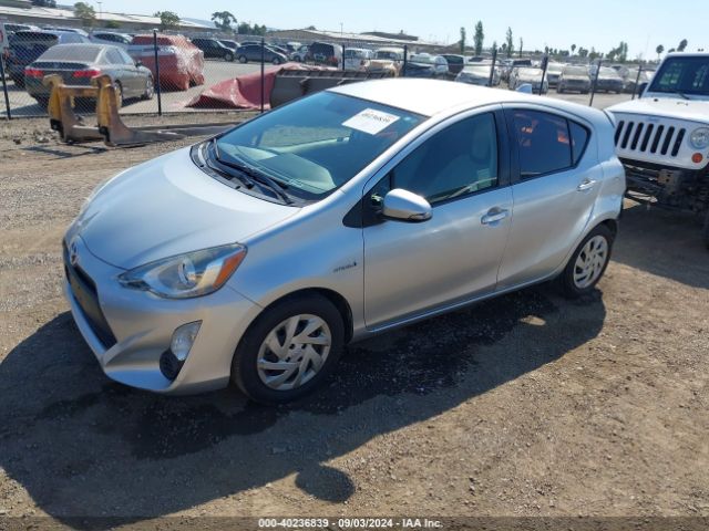 Photo 1 VIN: JTDKDTB30F1576020 - TOYOTA PRIUS C 