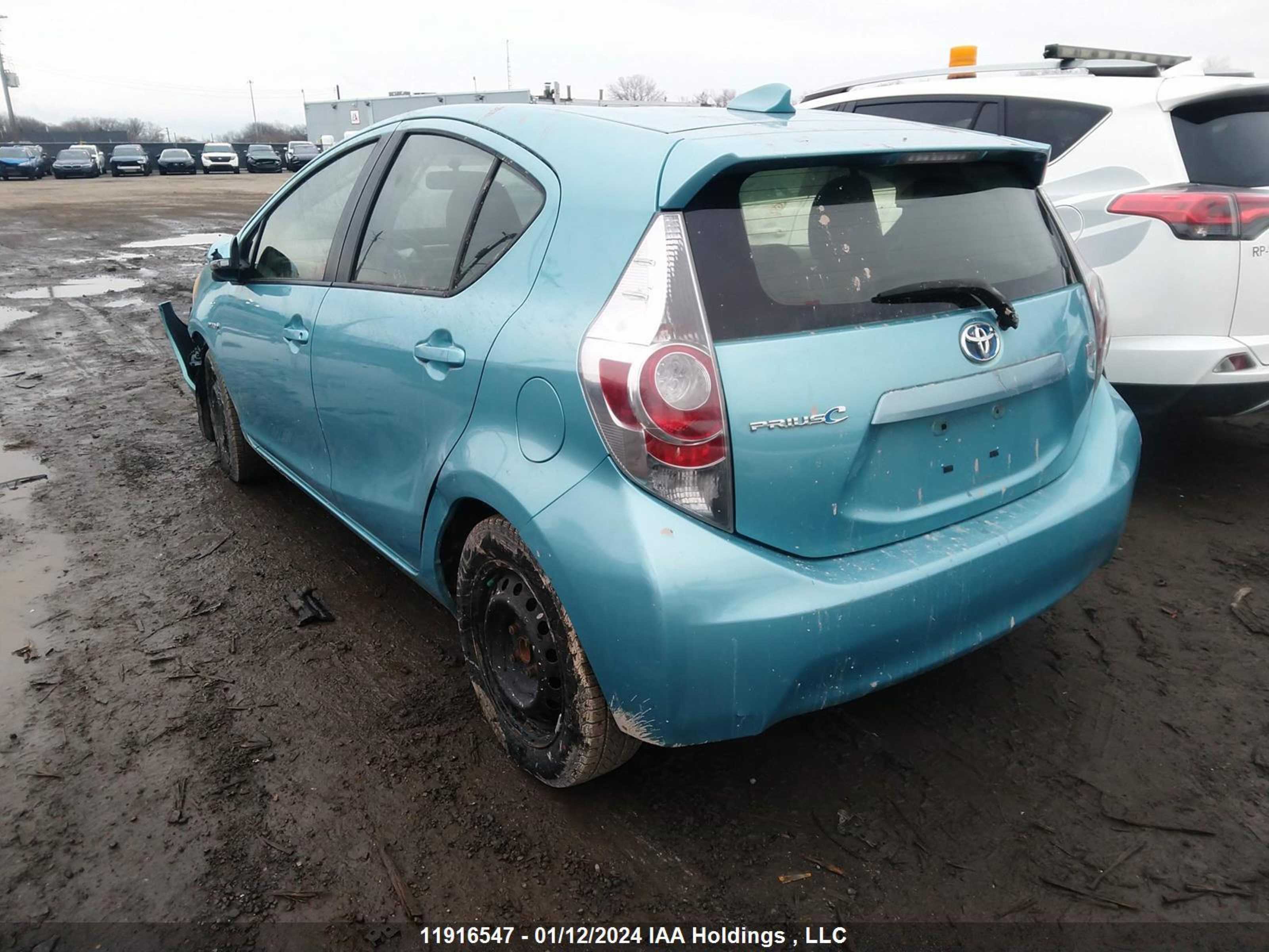 Photo 2 VIN: JTDKDTB31C1011867 - TOYOTA PRIUS C 