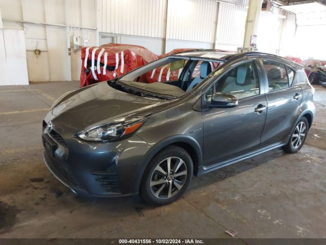 Photo 1 VIN: JTDKDTB31J1599427 - TOYOTA PRIUS C 