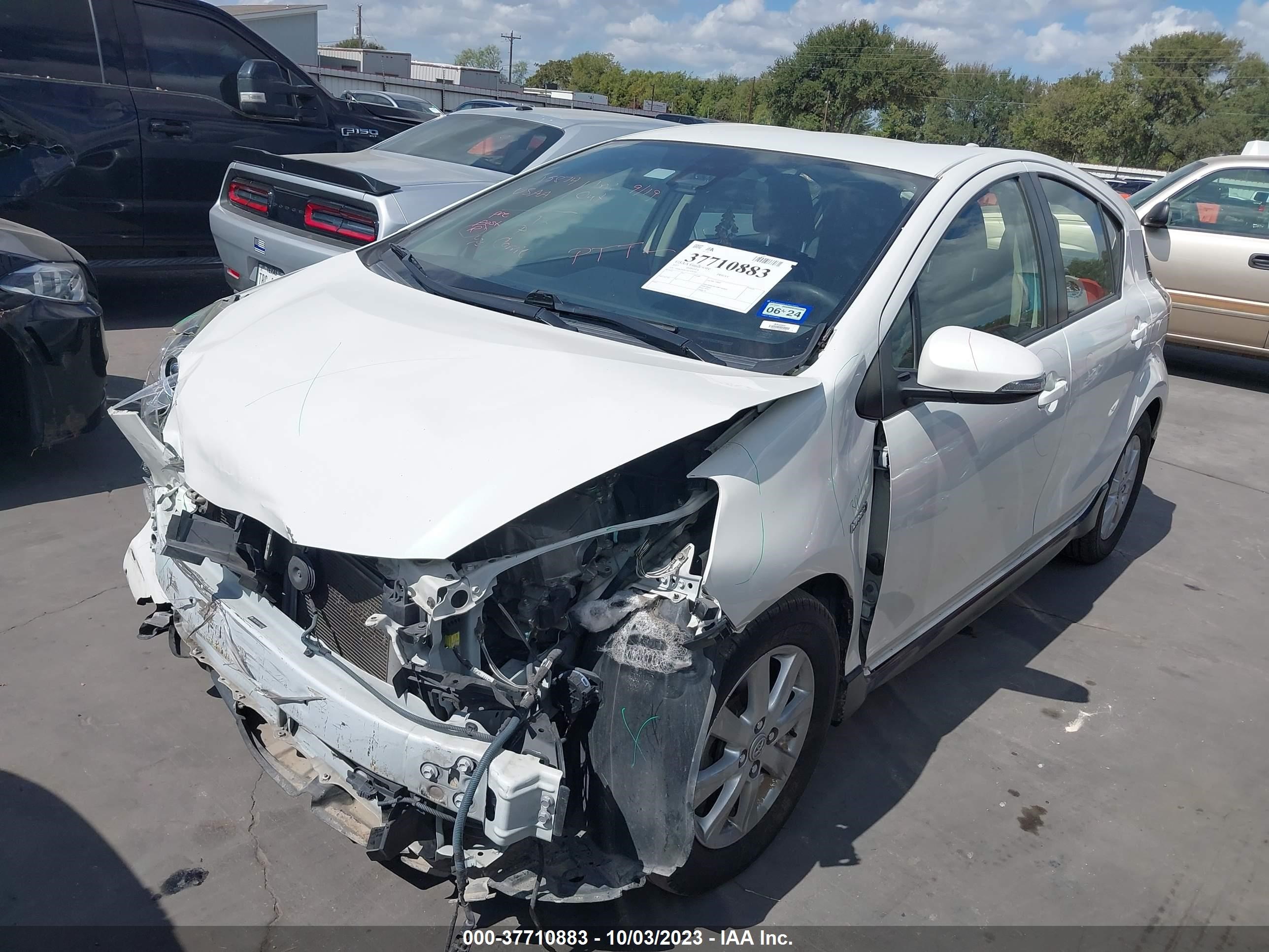 Photo 1 VIN: JTDKDTB32H1595090 - TOYOTA PRIUS C 