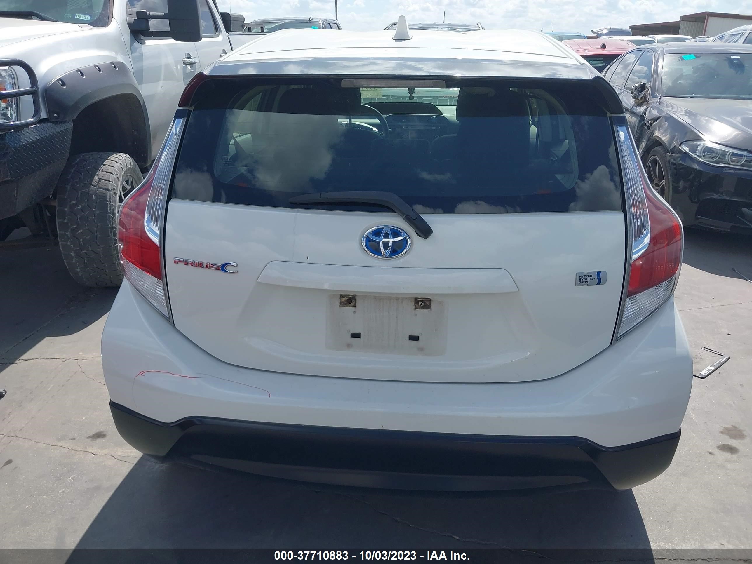 Photo 16 VIN: JTDKDTB32H1595090 - TOYOTA PRIUS C 