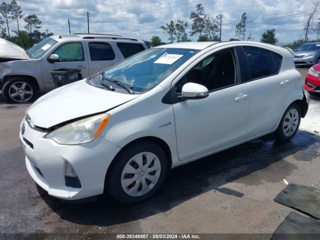 Photo 1 VIN: JTDKDTB33C1027990 - TOYOTA PRIUS C 