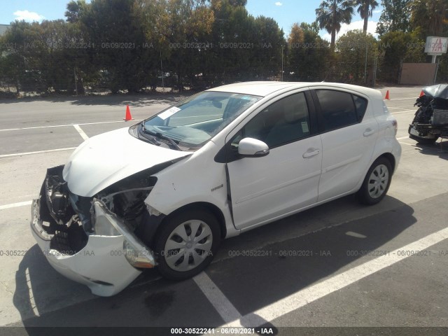 Photo 1 VIN: JTDKDTB33D1530825 - TOYOTA PRIUS C 