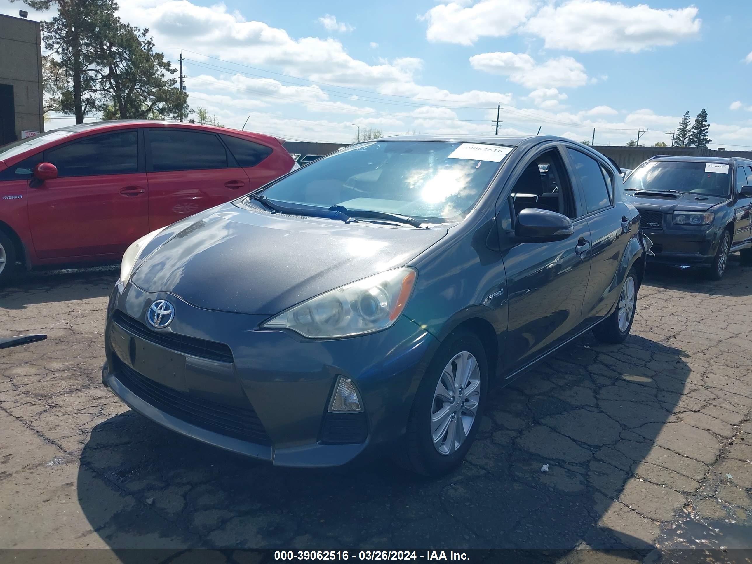 Photo 1 VIN: JTDKDTB34C1003228 - TOYOTA PRIUS C 