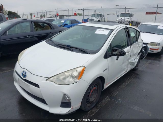 Photo 1 VIN: JTDKDTB34C1026279 - TOYOTA PRIUS C 