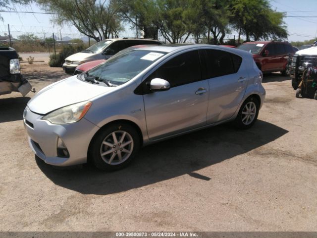 Photo 1 VIN: JTDKDTB34C1029408 - TOYOTA PRIUS C 