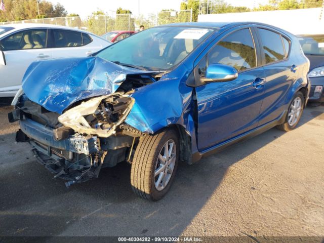 Photo 1 VIN: JTDKDTB34H1593633 - TOYOTA PRIUS C 