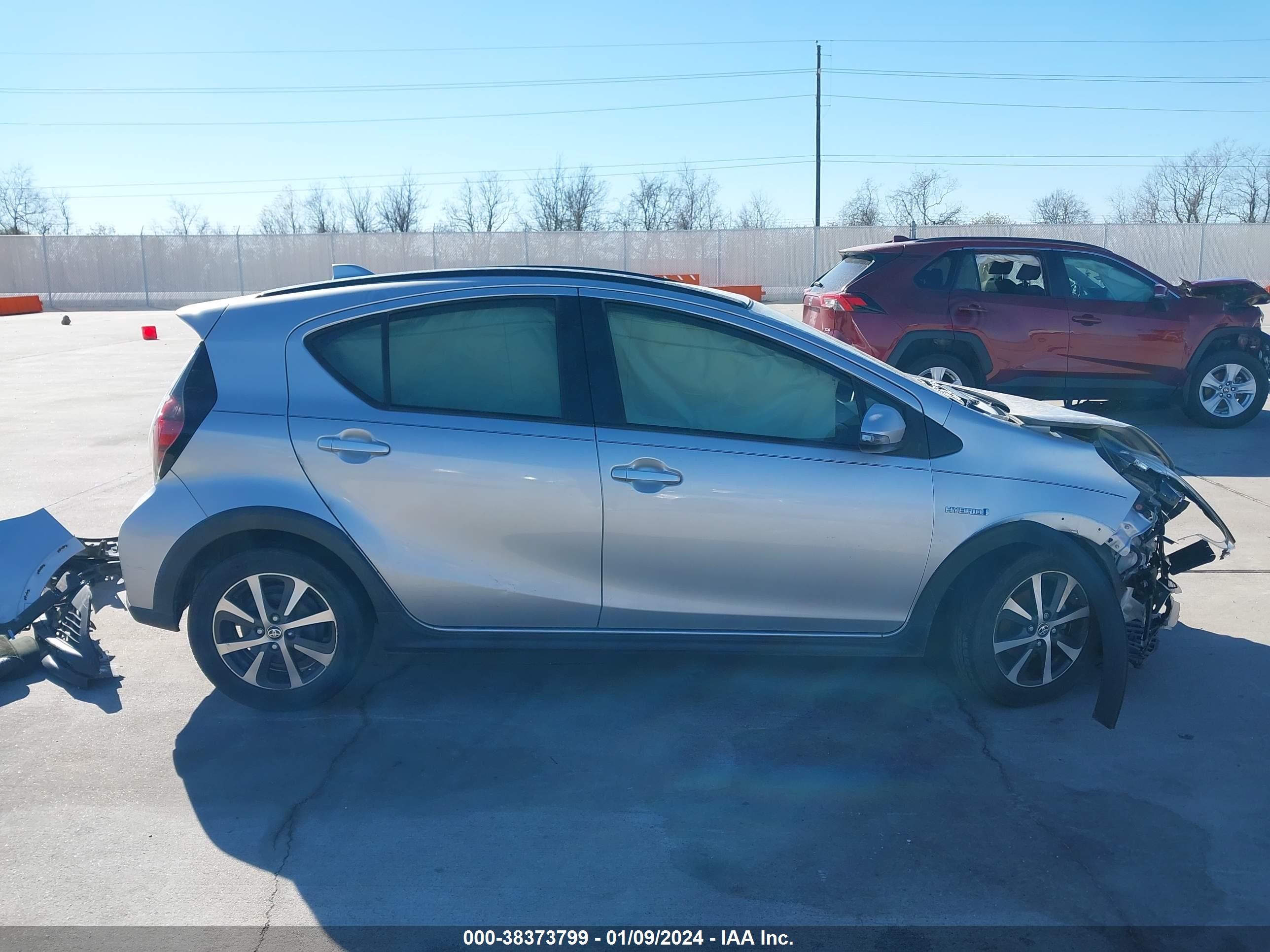 Photo 11 VIN: JTDKDTB35J1604905 - TOYOTA PRIUS C 