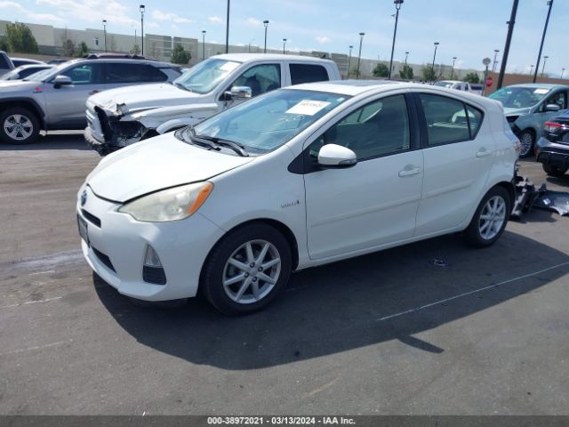 Photo 1 VIN: JTDKDTB37D1041098 - TOYOTA PRIUS C 