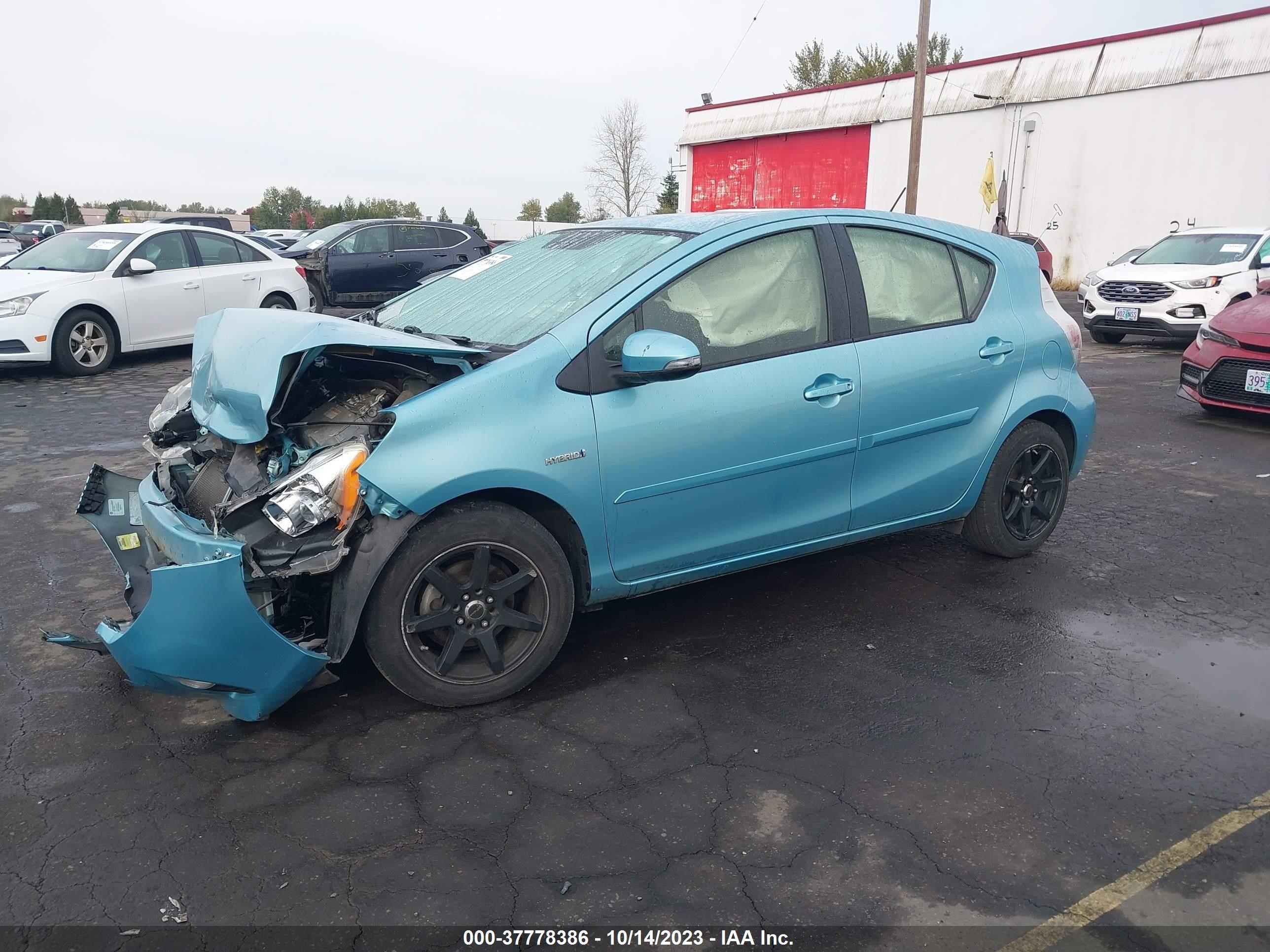 Photo 1 VIN: JTDKDTB37D1046608 - TOYOTA PRIUS C 