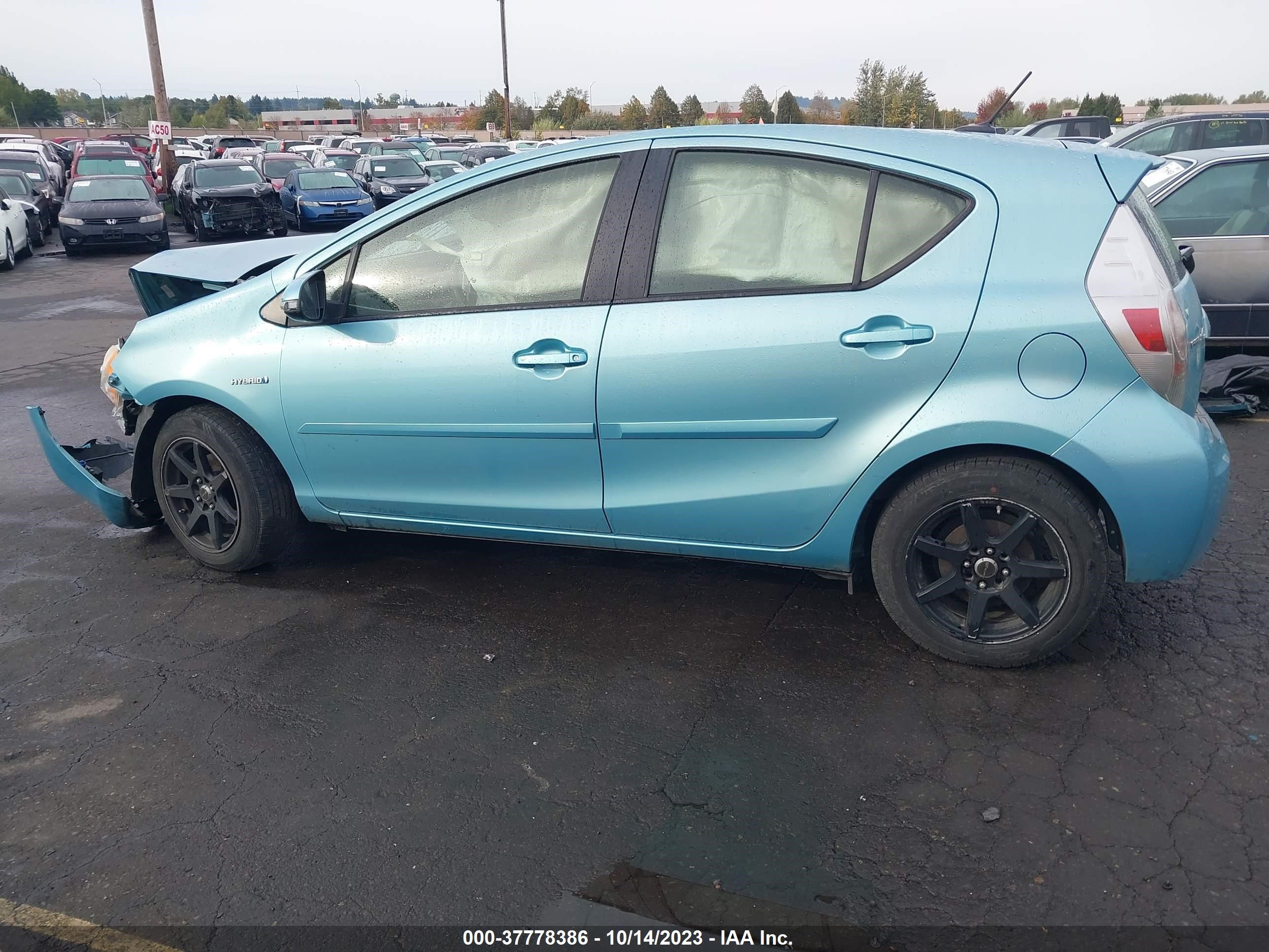 Photo 12 VIN: JTDKDTB37D1046608 - TOYOTA PRIUS C 