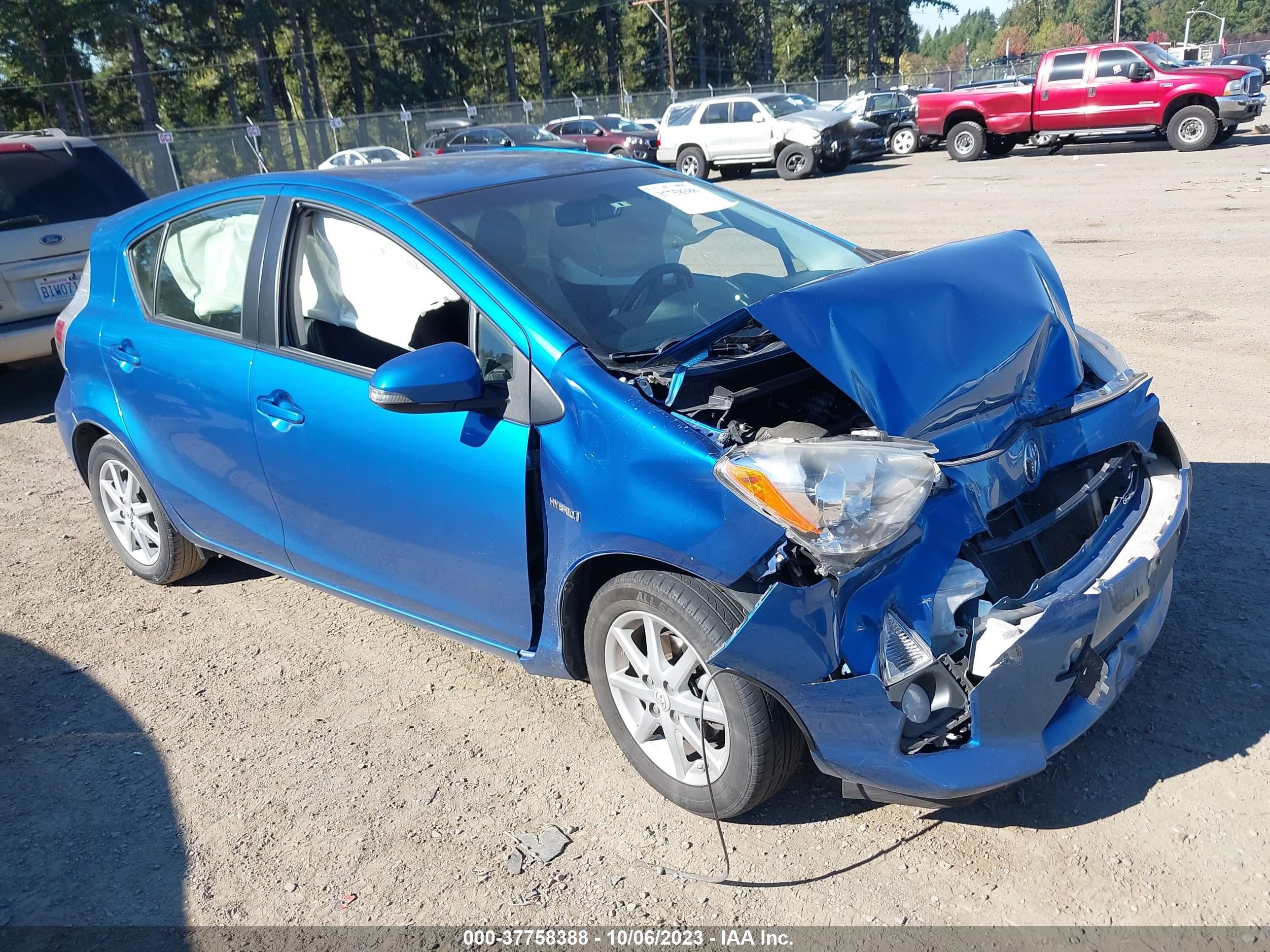 Photo 0 VIN: JTDKDTB38D1039585 - TOYOTA PRIUS C 