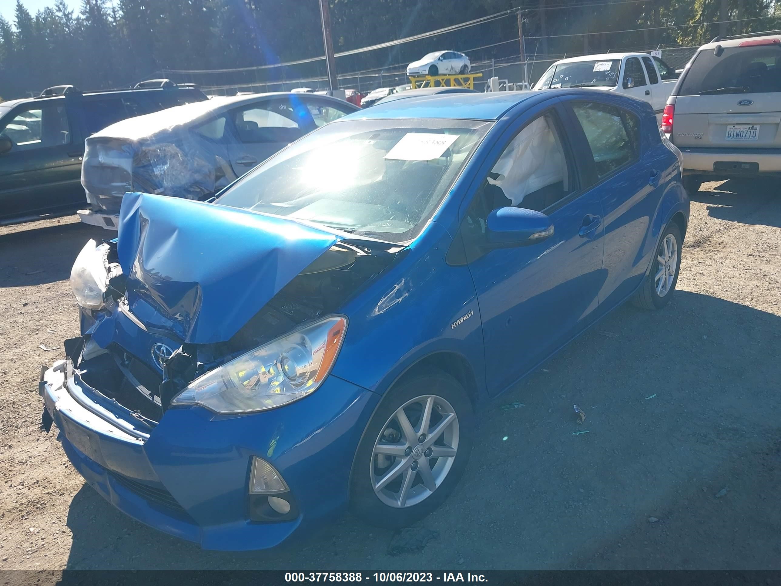 Photo 1 VIN: JTDKDTB38D1039585 - TOYOTA PRIUS C 