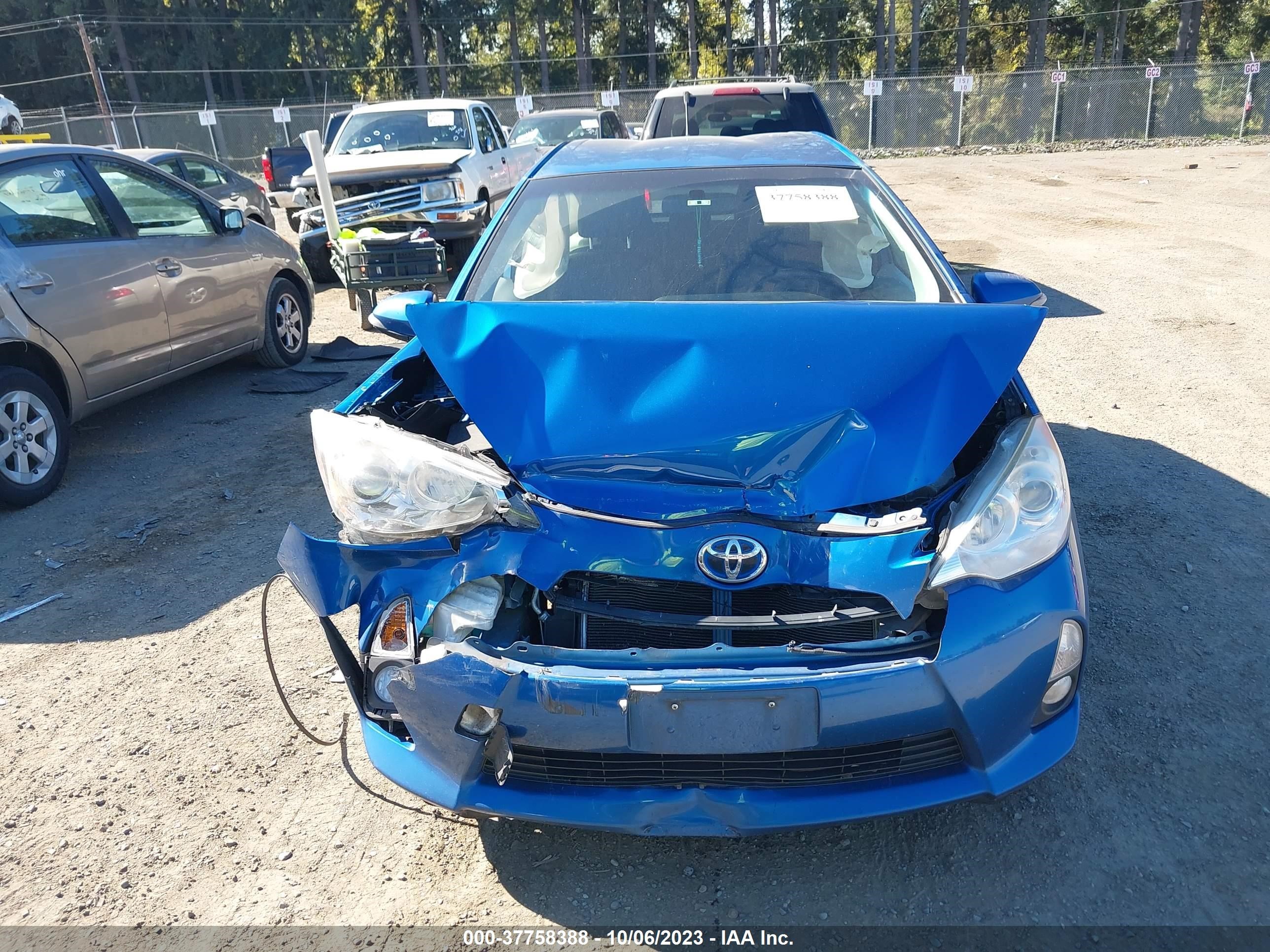 Photo 10 VIN: JTDKDTB38D1039585 - TOYOTA PRIUS C 