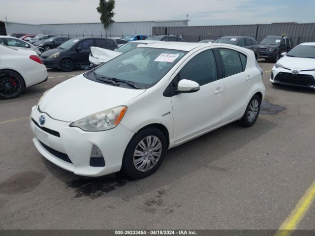 Photo 1 VIN: JTDKDTB39D1543627 - TOYOTA PRIUS C 