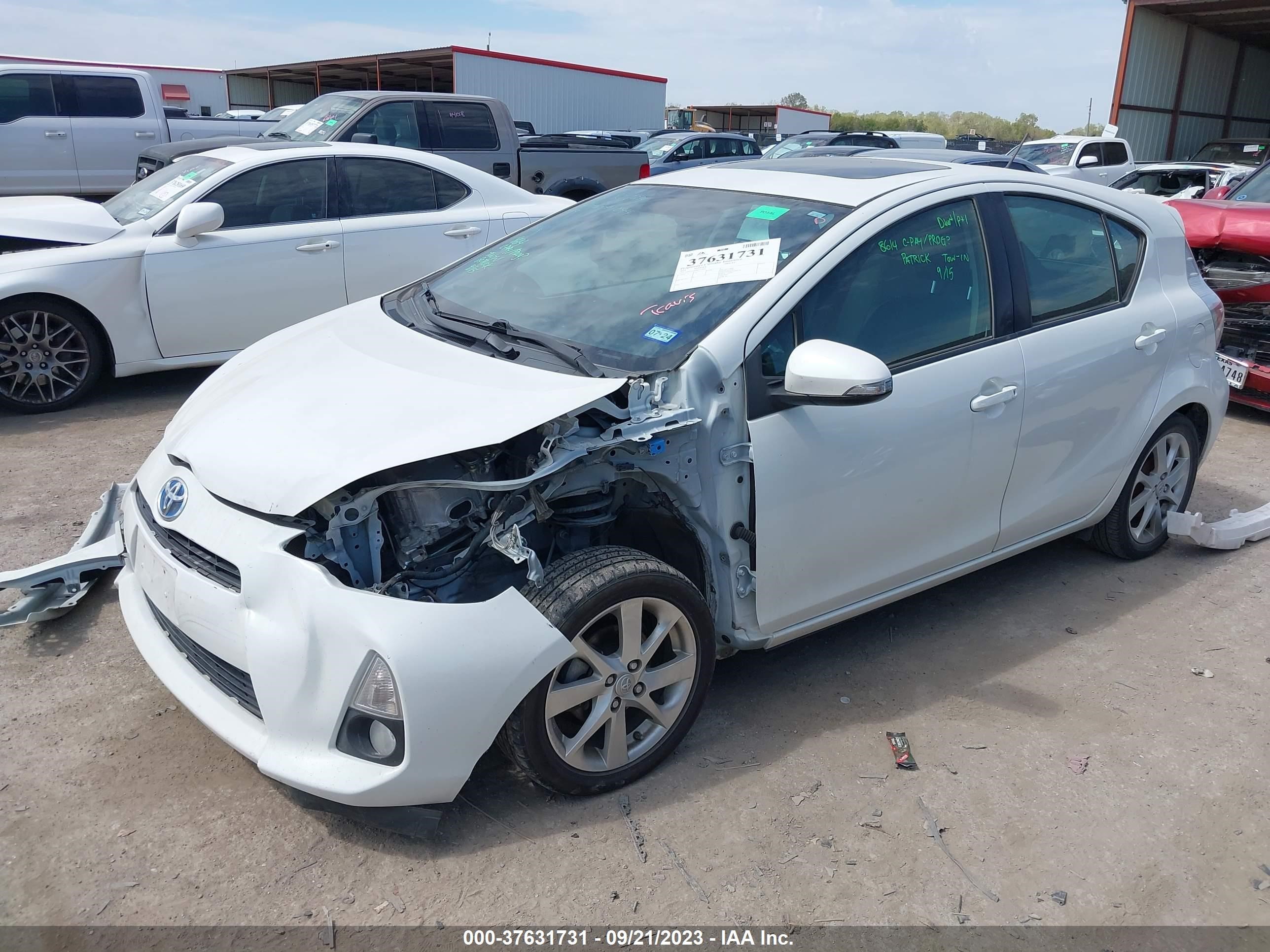 Photo 1 VIN: JTDKDTB39E1079482 - TOYOTA PRIUS C 